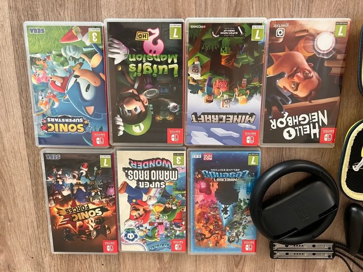 Nintendo Switch Oled with Games and all Accessories - Image 2