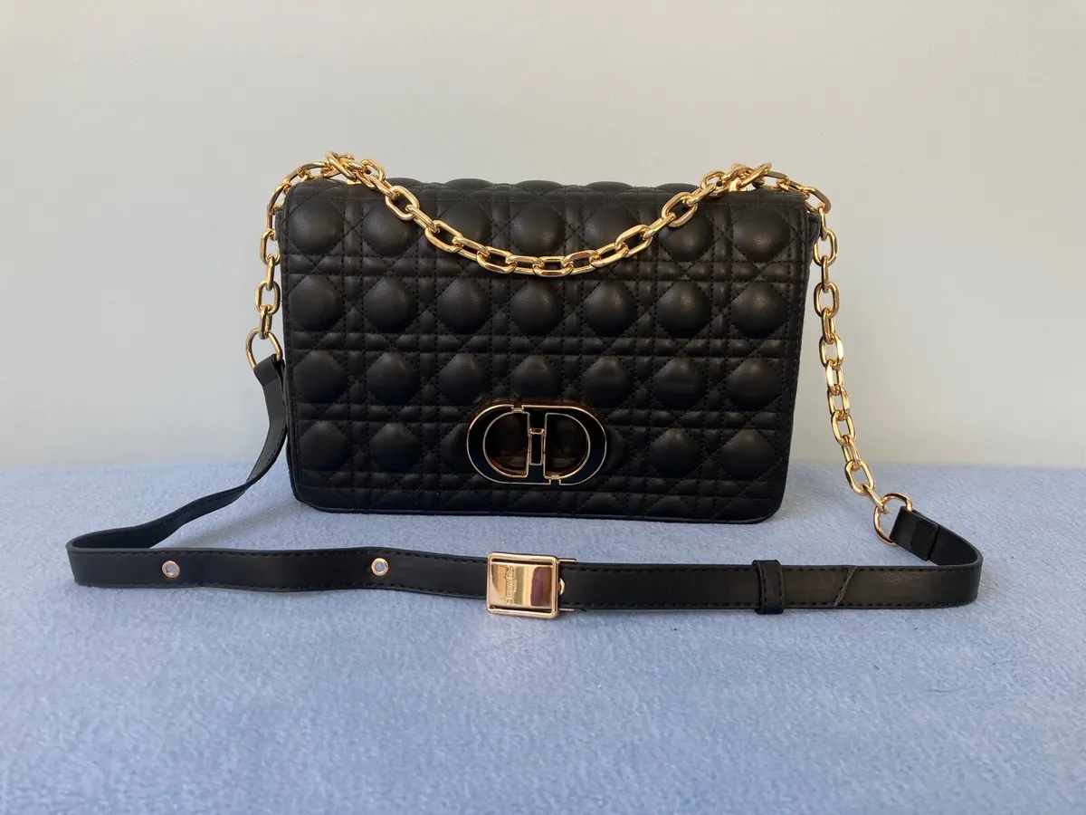 Gorgeous Black Quilted Bag with Gold Chain Trim - Image 1