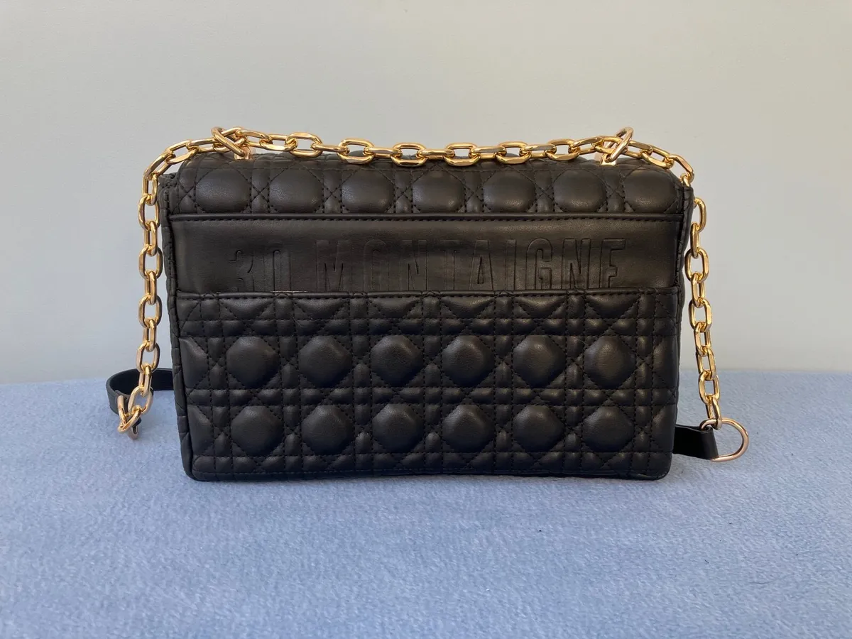 Gorgeous Black Quilted Bag with Gold Chain Trim - Image 2