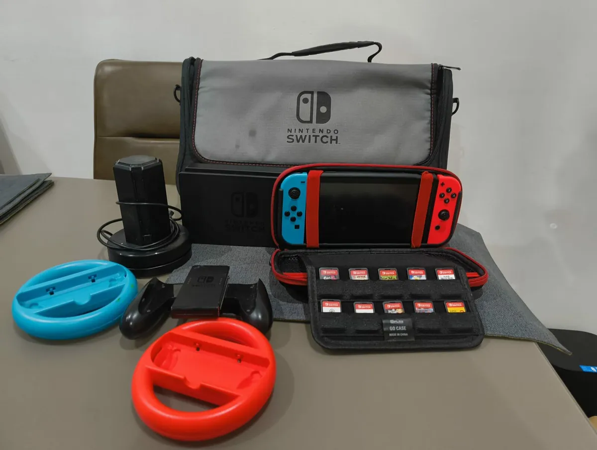 Nintendo Switch with kit & Eleven Games - Image 1
