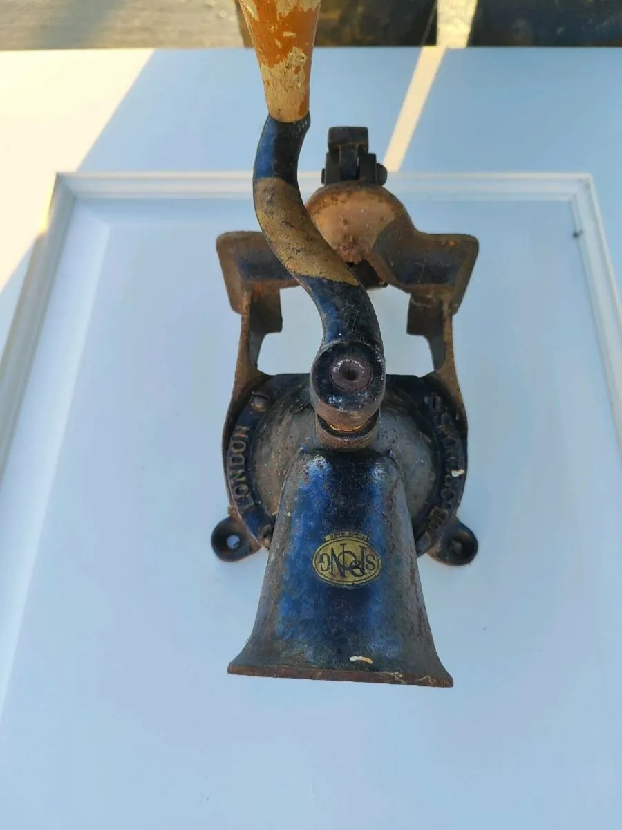 a beautiful old coffee grinder - Image 1