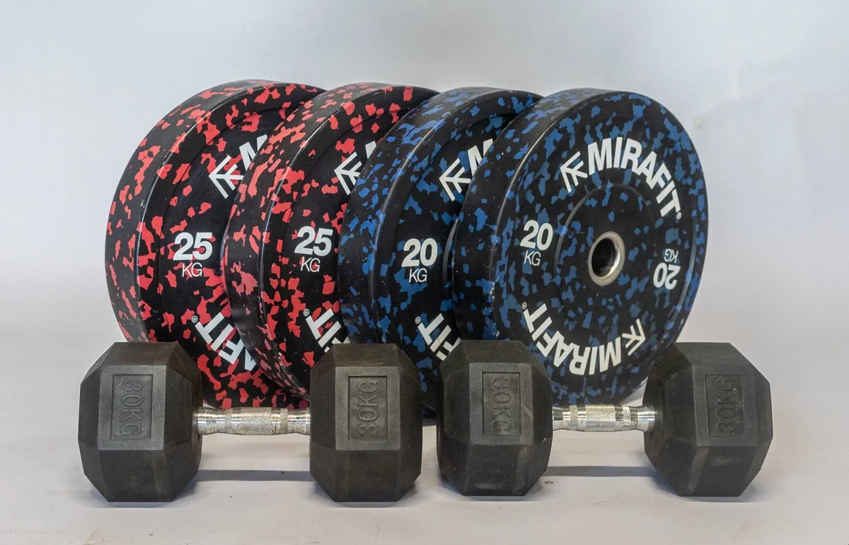 weight plates and dumbells - Image 1