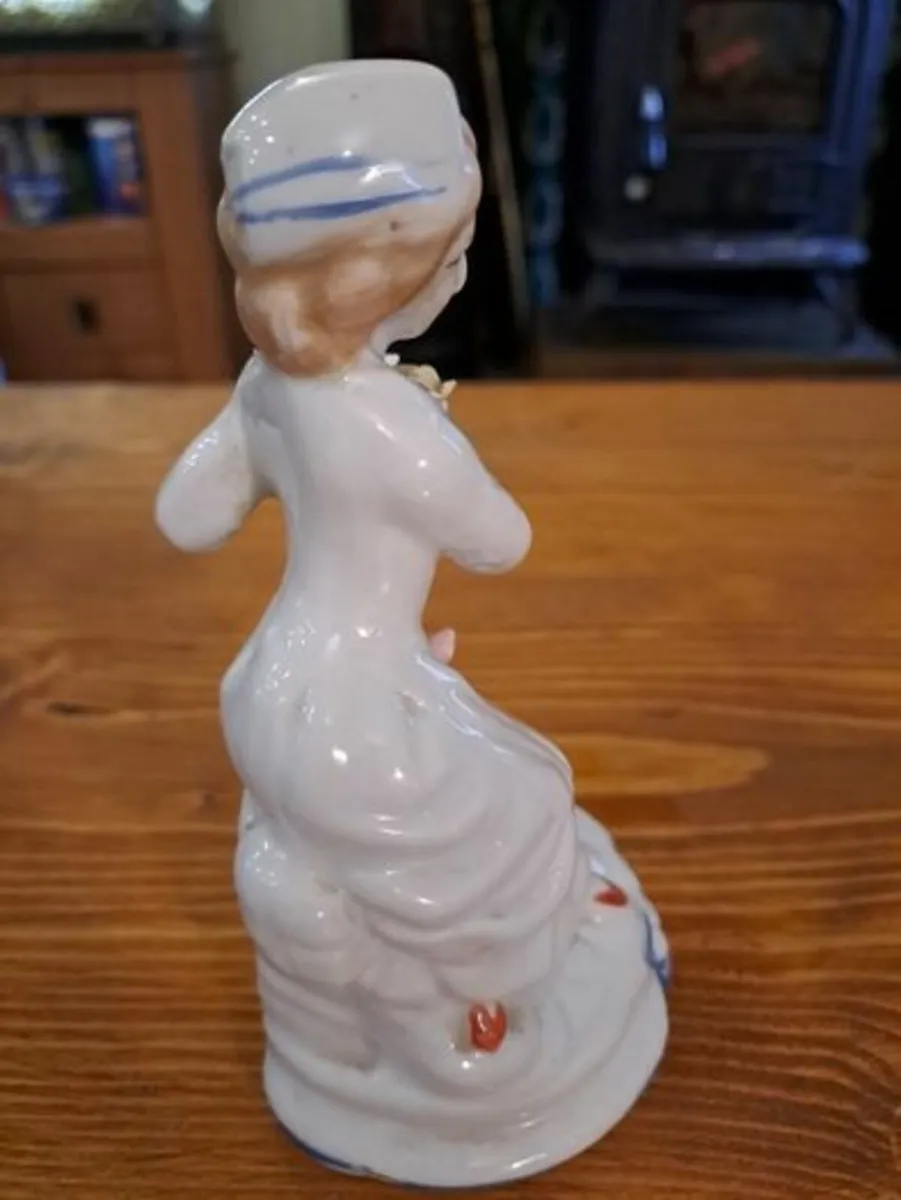 Vintage porcelain woman figurine detailed flowers - Image 2