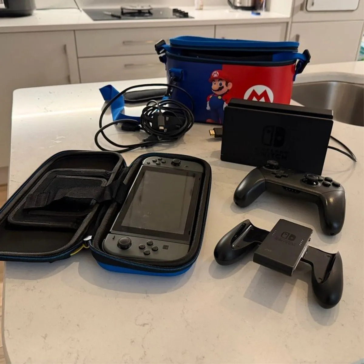 Nintendo Switch and Travel Case - Image 1