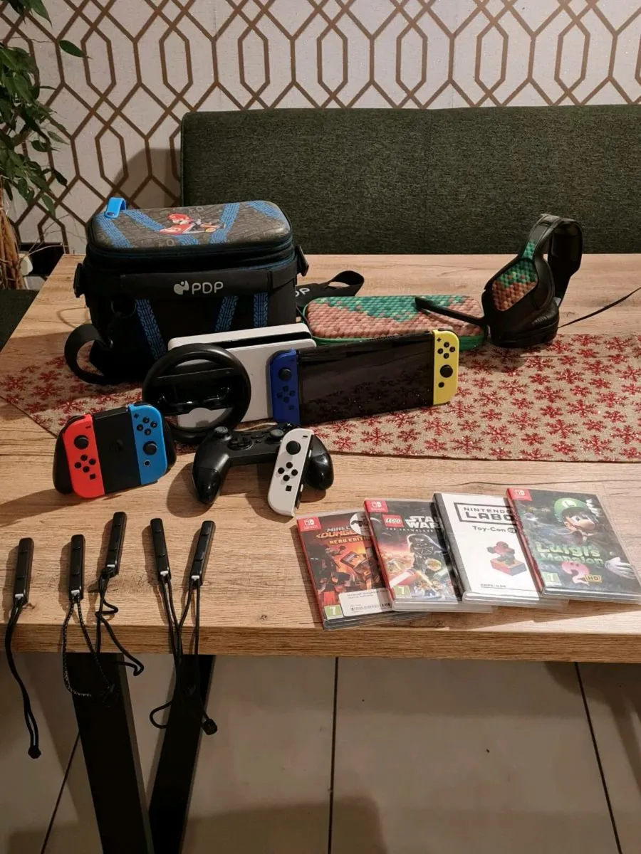 Switch Oled console plus accessories and games - Image 1