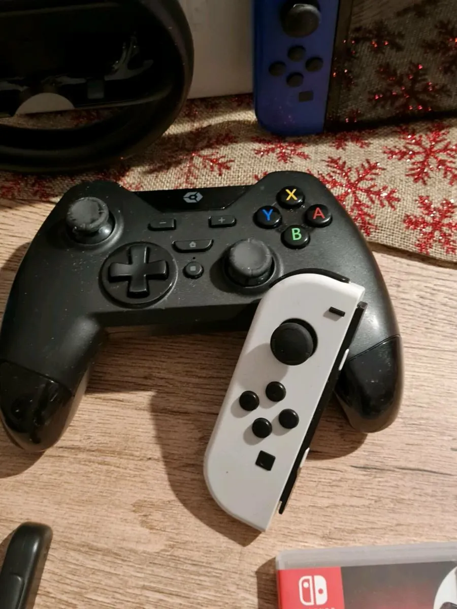 Switch Oled console plus accessories and games - Image 3