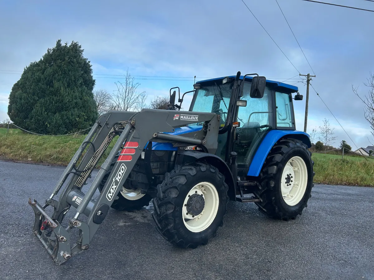 2001 New Holland TL100 with MX Loader - Image 1