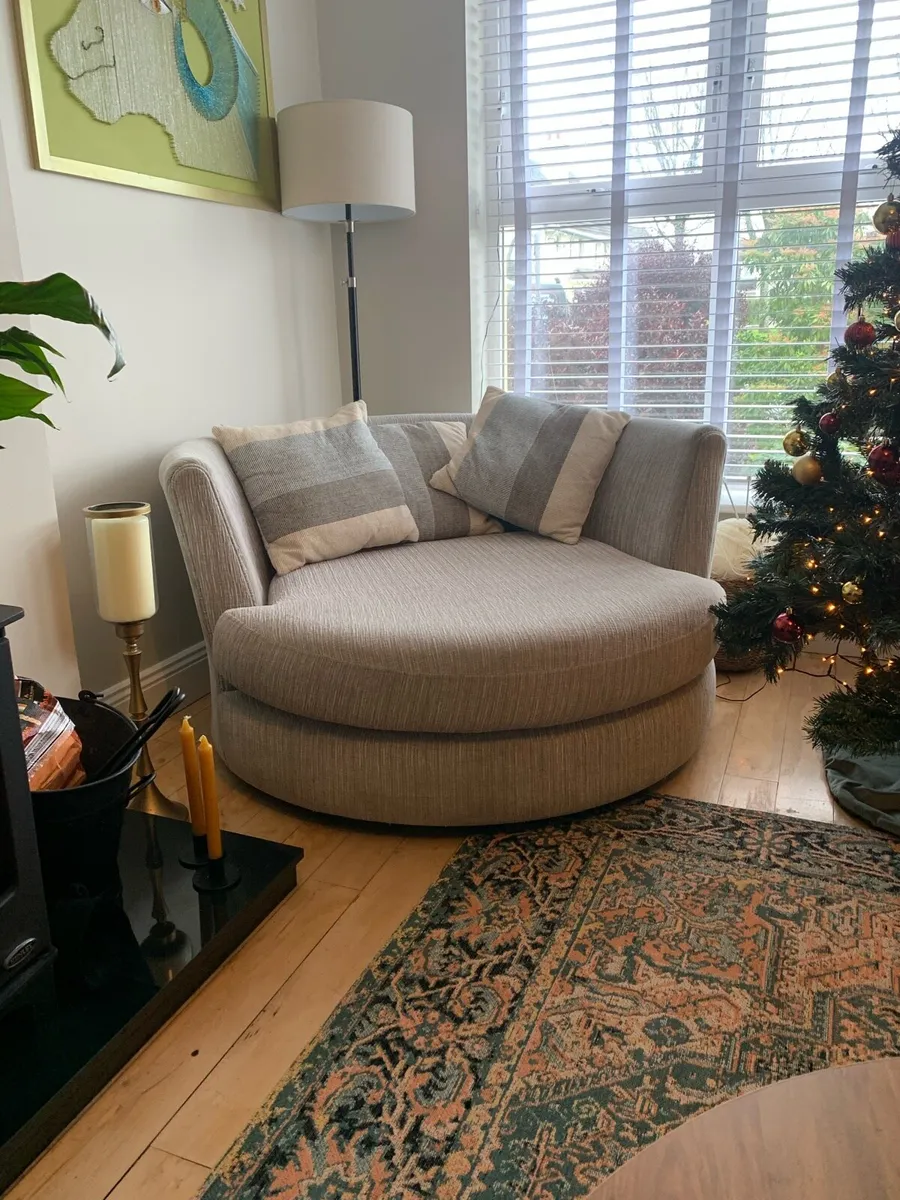 Large Snuggle Swivel Armchair Light Grey - Image 1