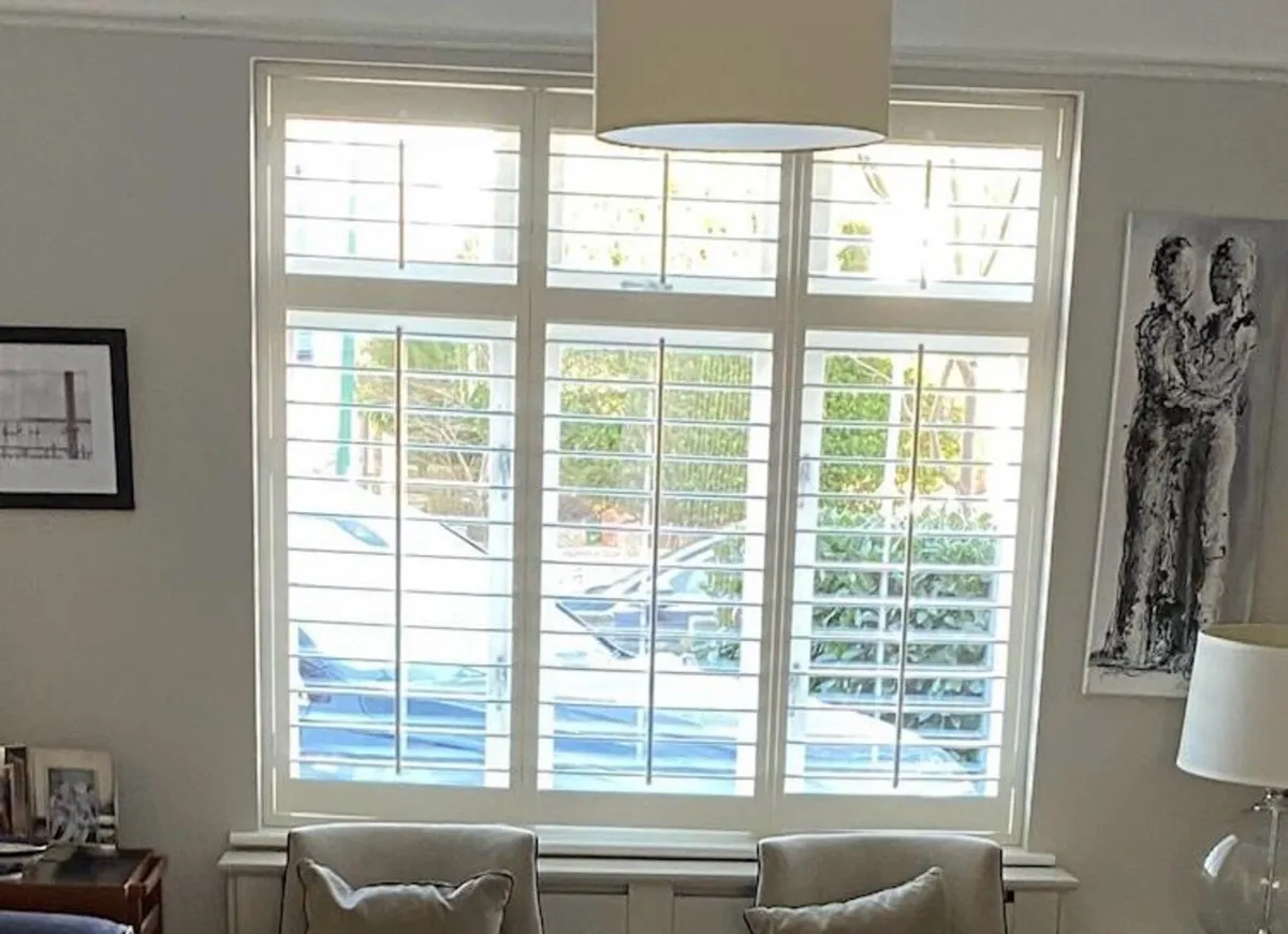 White interior plantation (louvred) shutters - Image 1