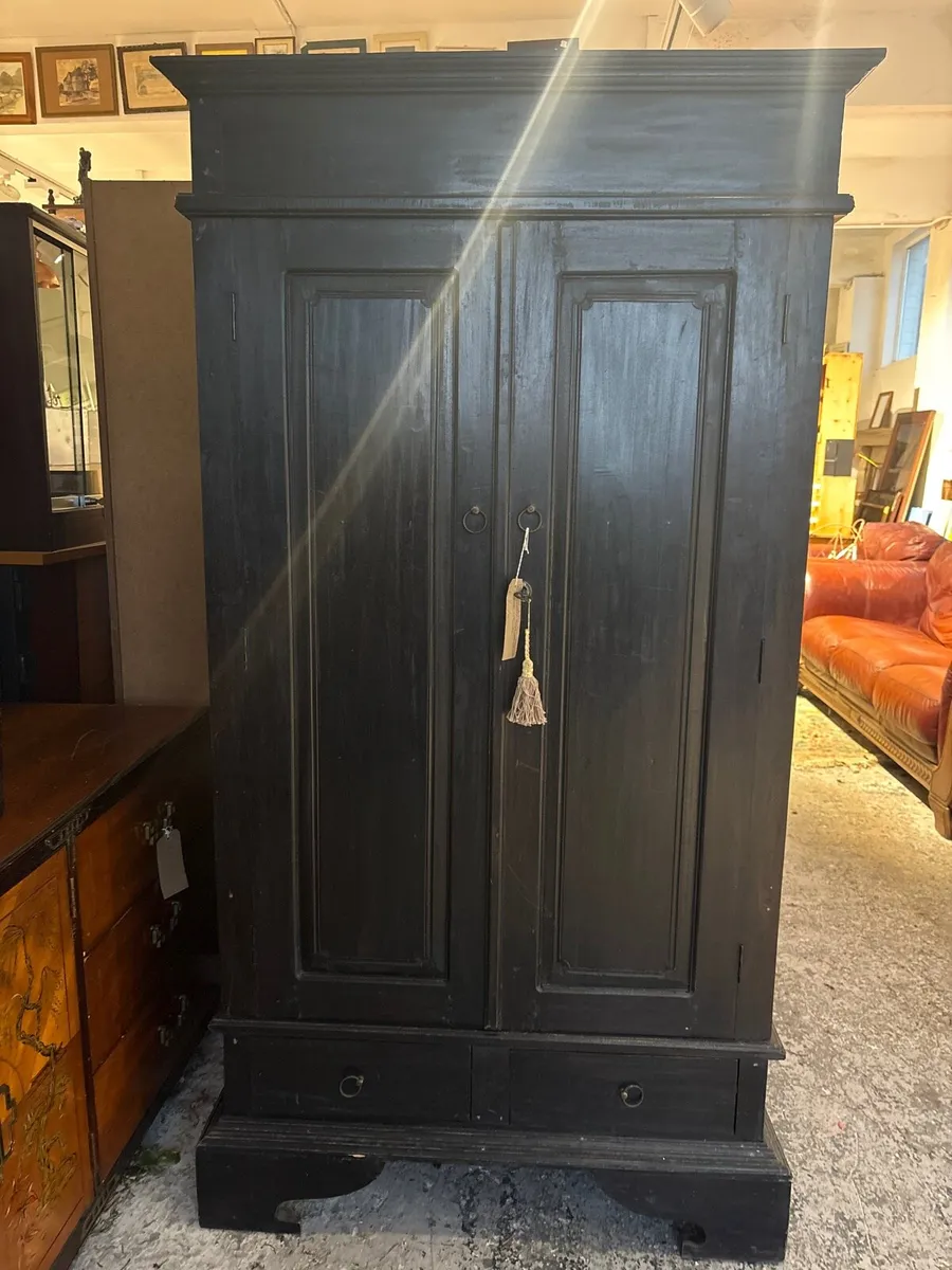 Dark wood double panel wardrobe - Image 1