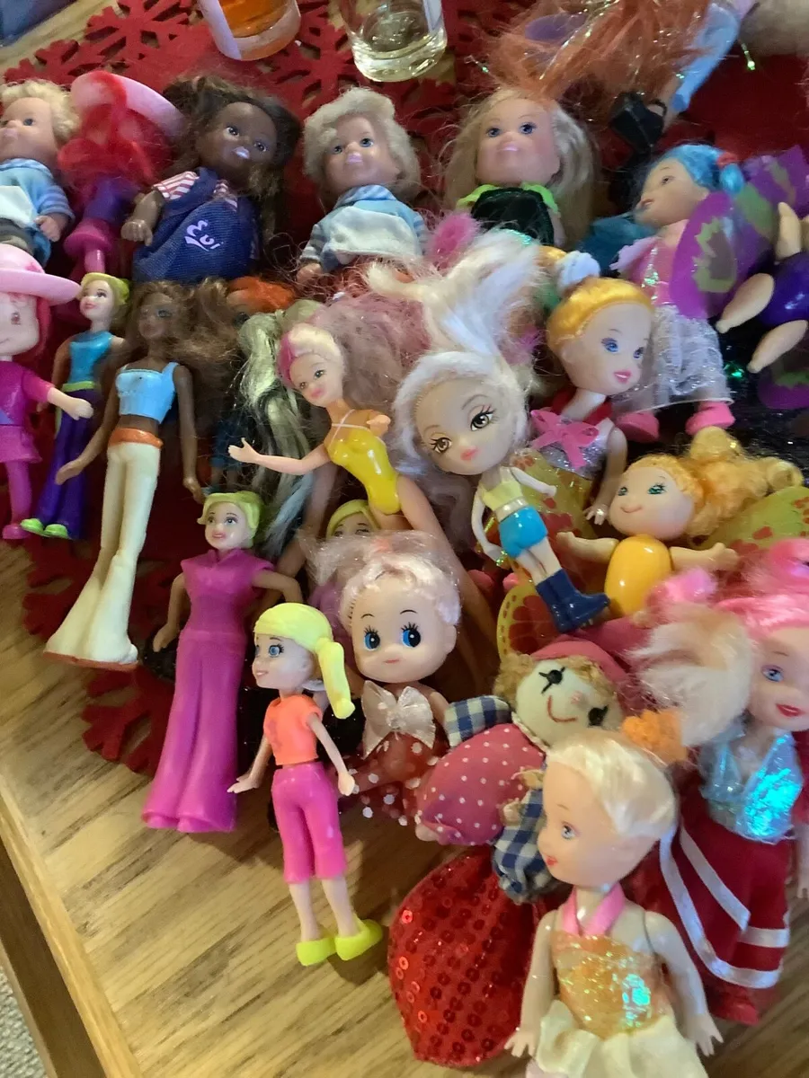 26 mini dolls
