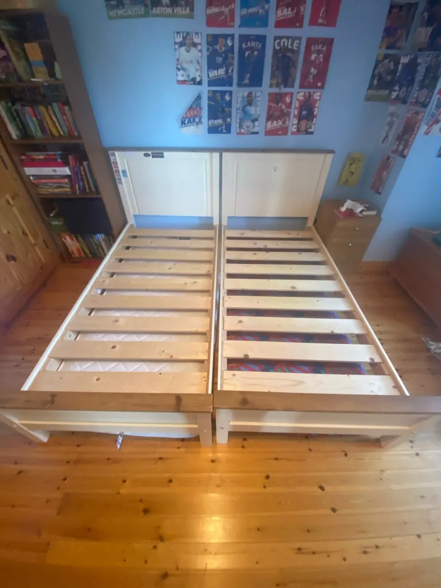 Two IKEA single bed frames - Image 1