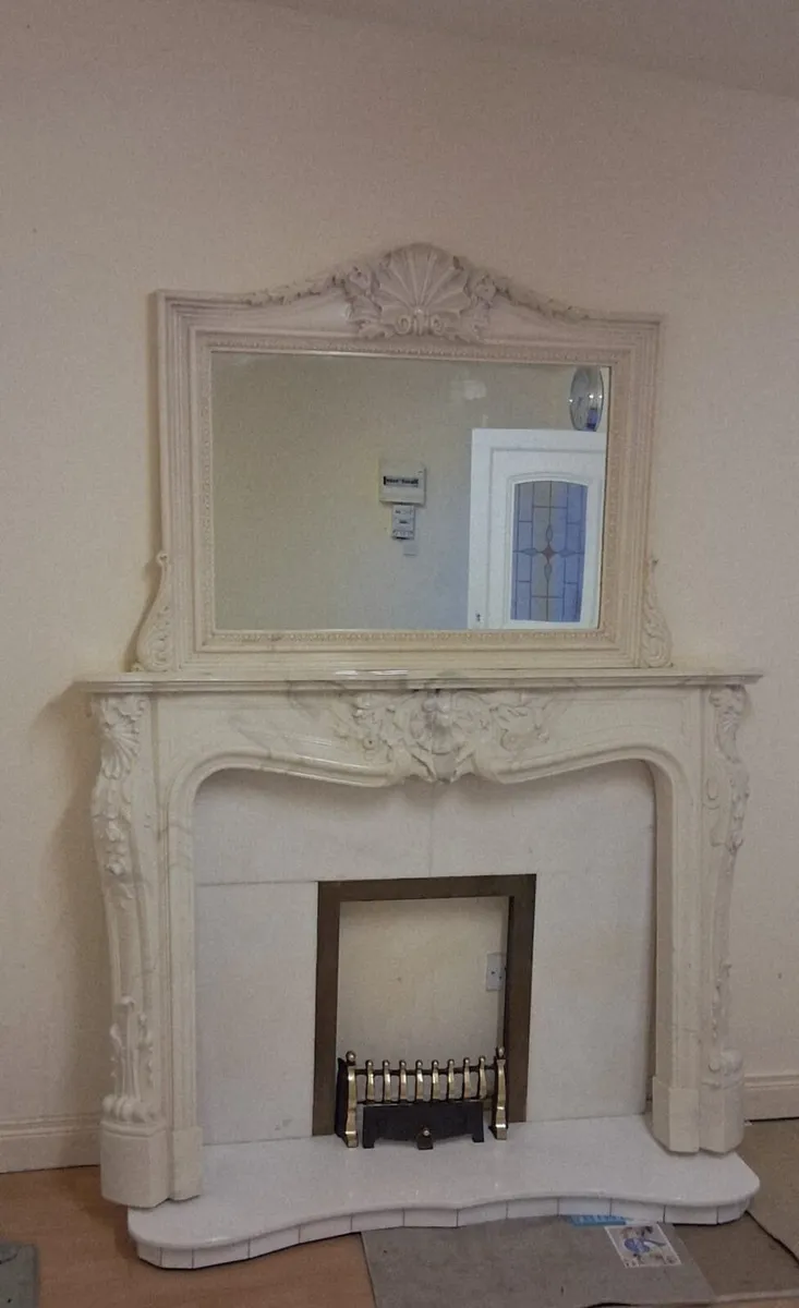 BEAUTIFUL MARBLE FIRE PLACE WITH MATCHING MIRROR. - Image 1