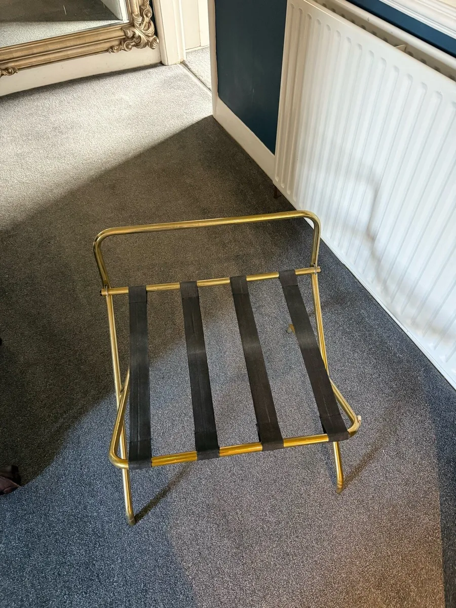 4 brass suitcase racks