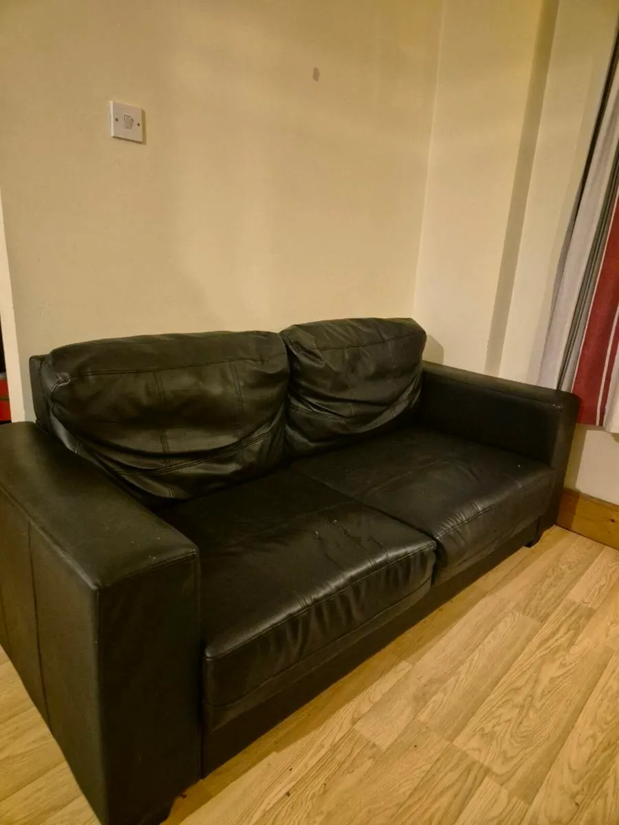 Black two seater sofa - Image 1