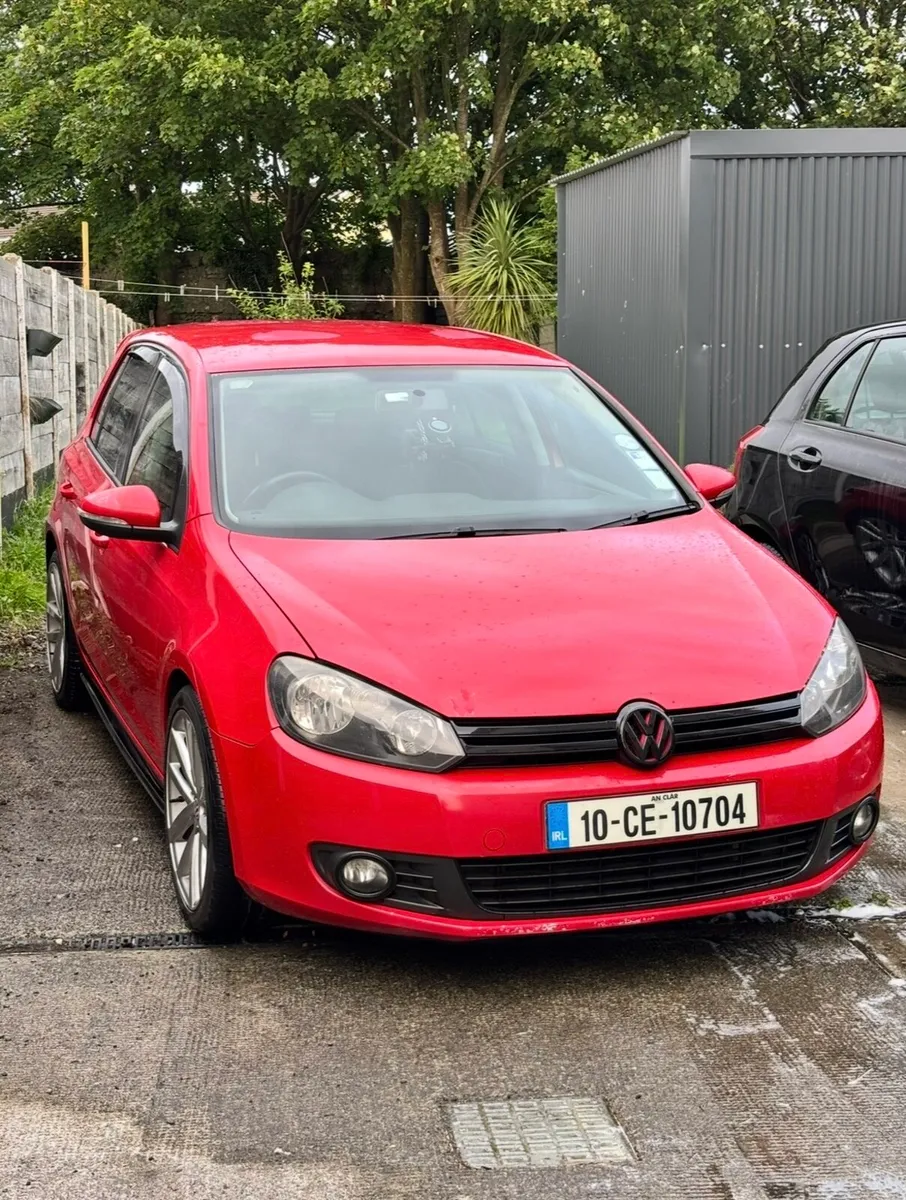 Red 2L Golf - Image 1