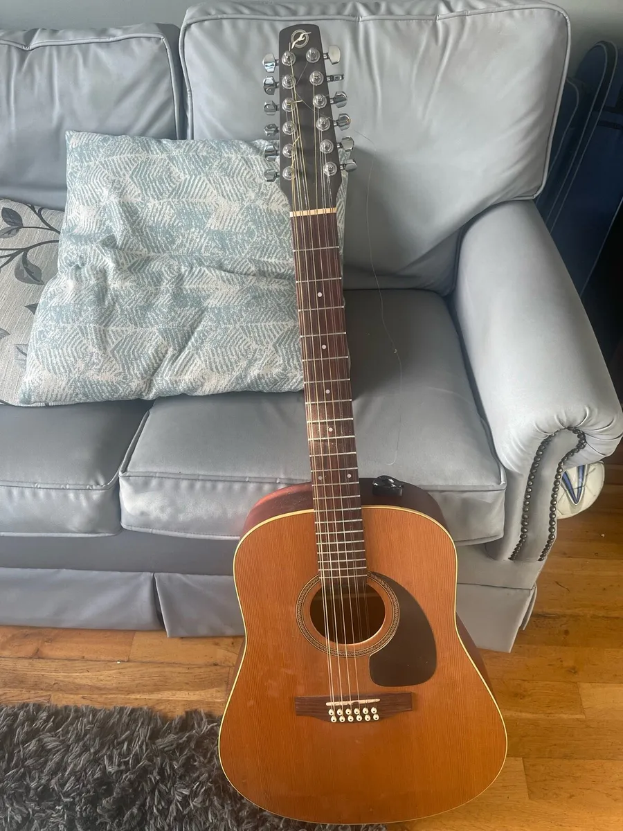 Guitars and banjo - Image 1