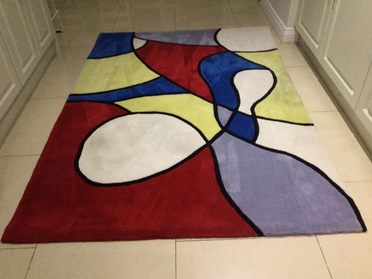 Large rug arm chair and pouffe - Image 1