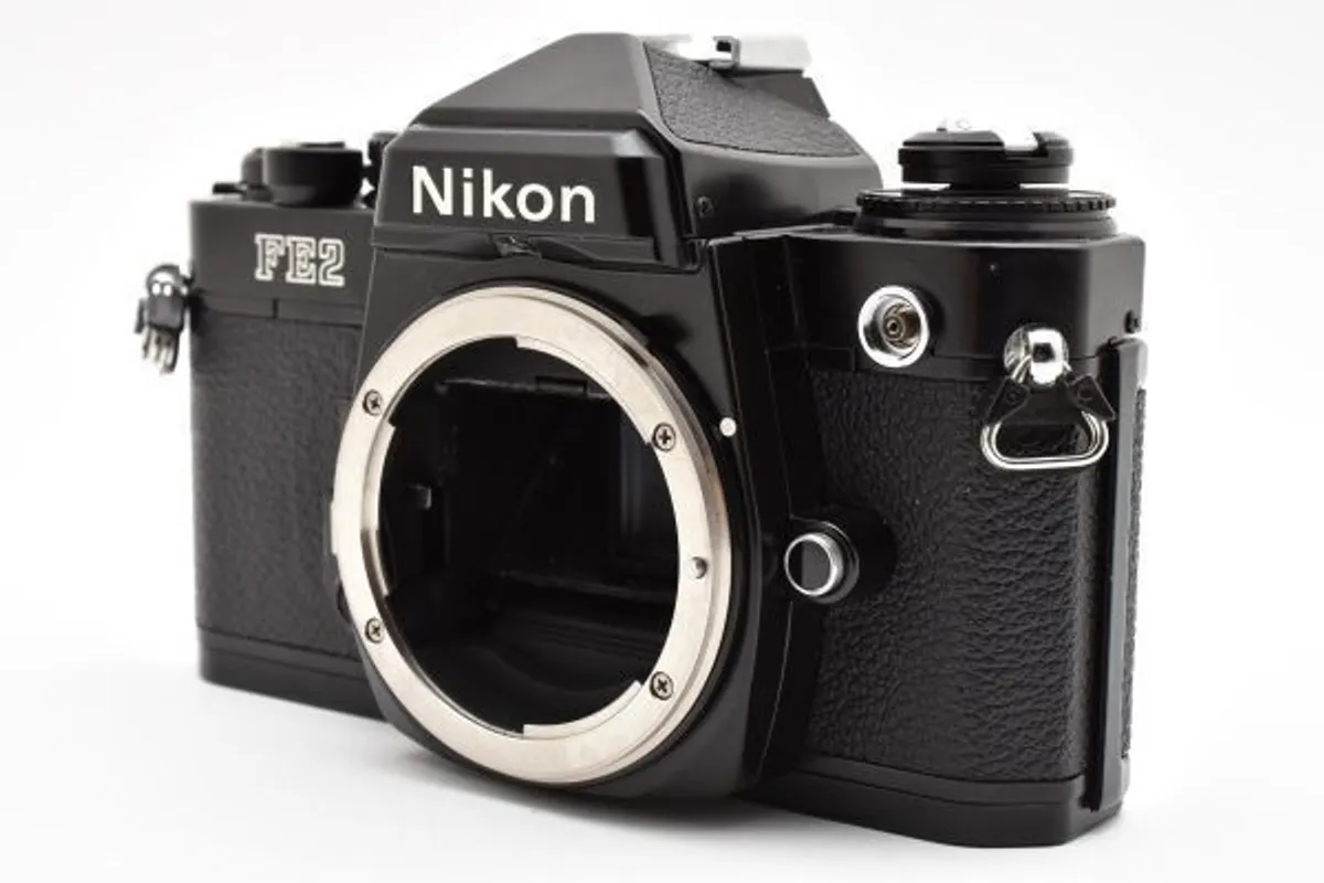 Nikon FE2 Black SLR 35mm Film camera Honeycomb - Image 1