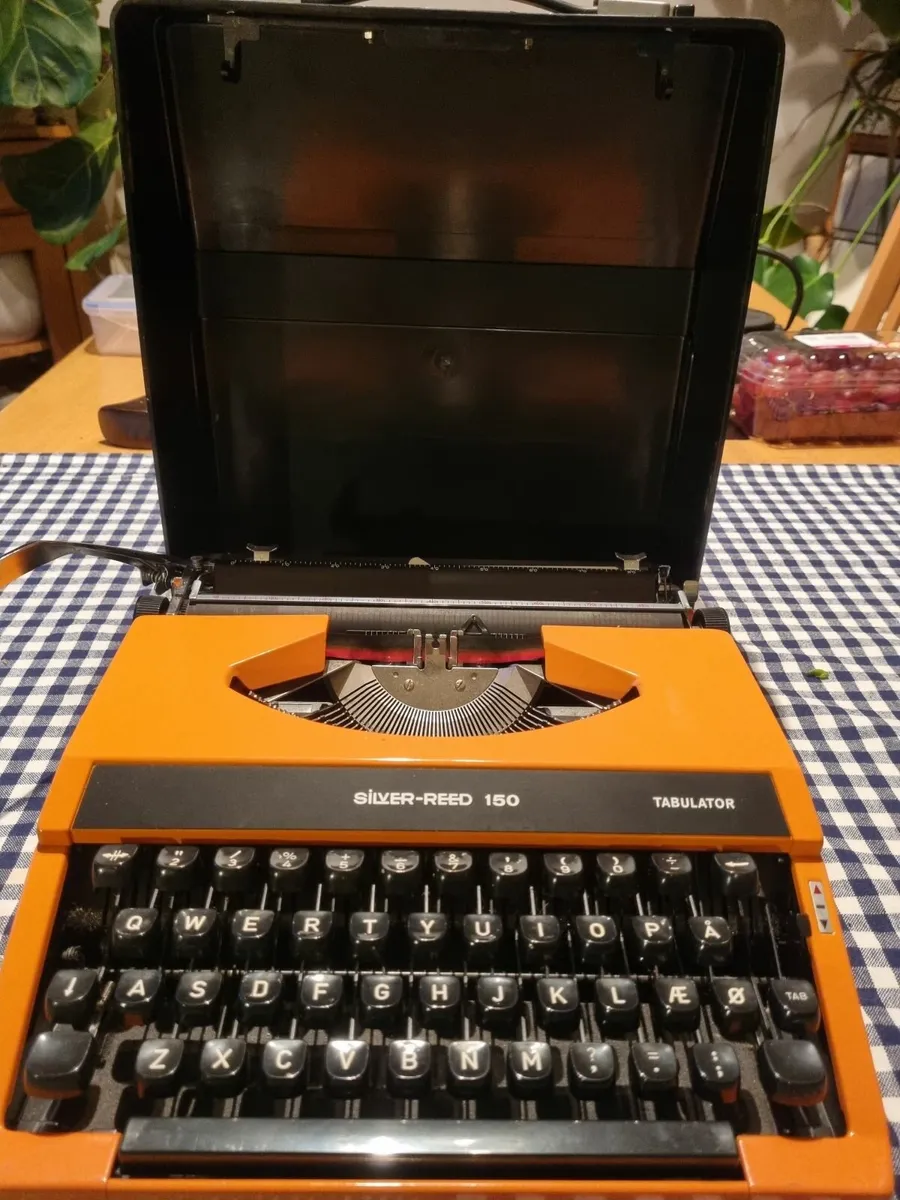 Silver Reed 150 Typewriter in Orange - Image 1