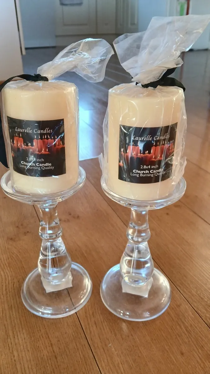 Glass candlesticks and candles