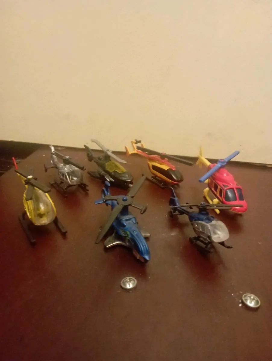 A  COLLECTION OF MINIATURE DIE-CAST HELLCOPTERS - Image 1