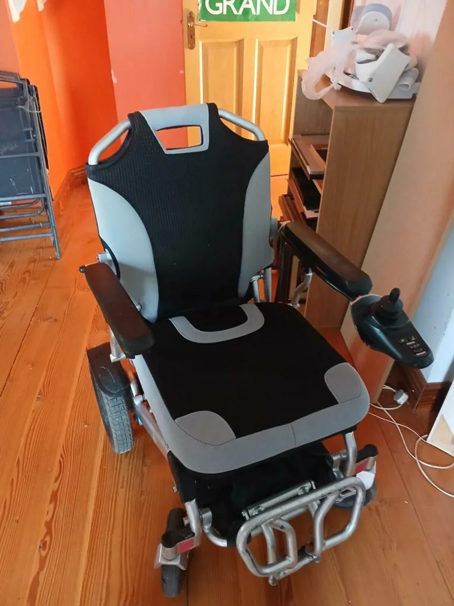 Foldable electric wheelchair - Image 1