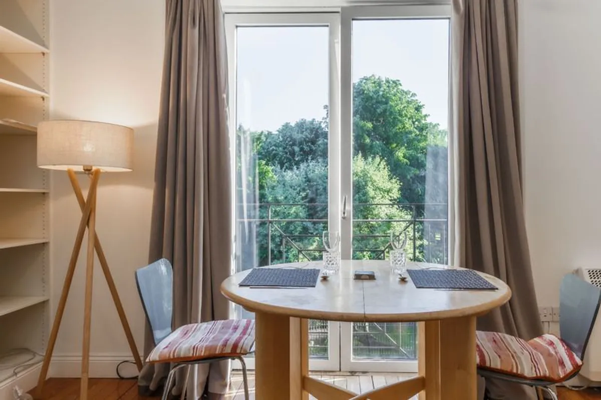 Solid Wood Round Dining Table (Extending) - Image 2