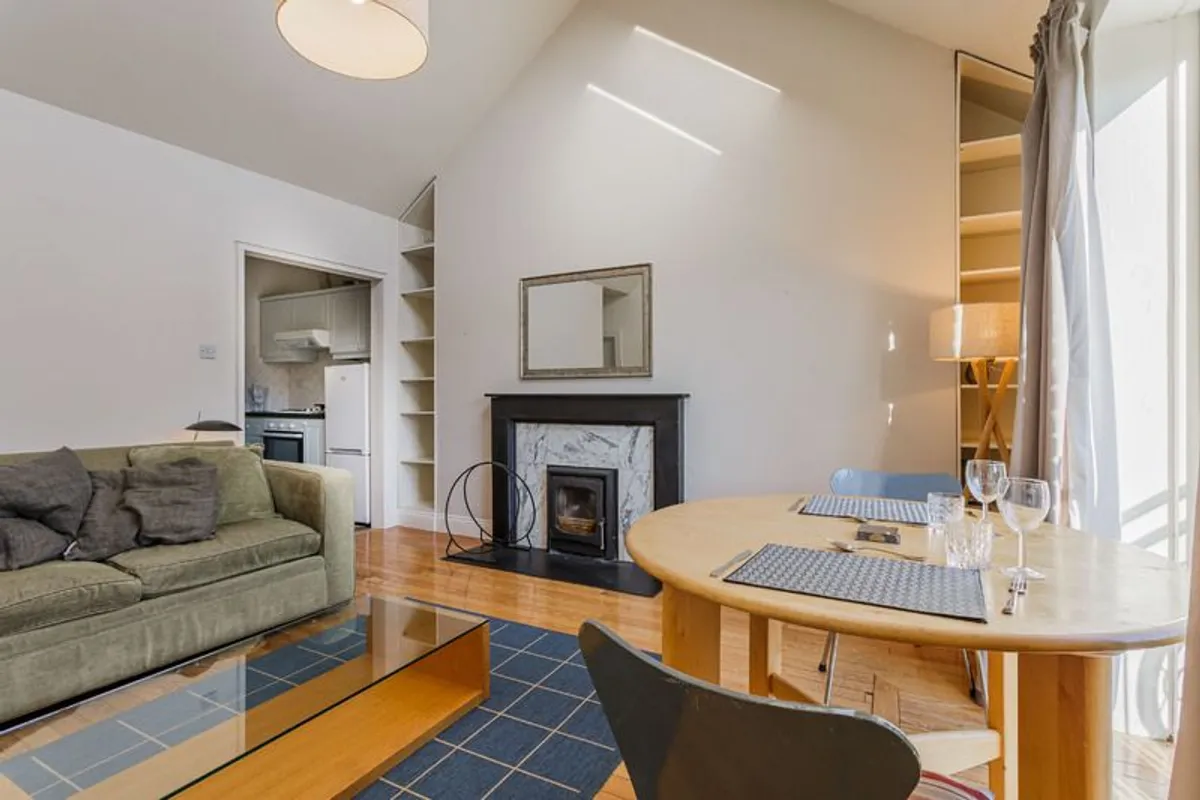 Solid Wood Round Dining Table (Extending) - Image 3