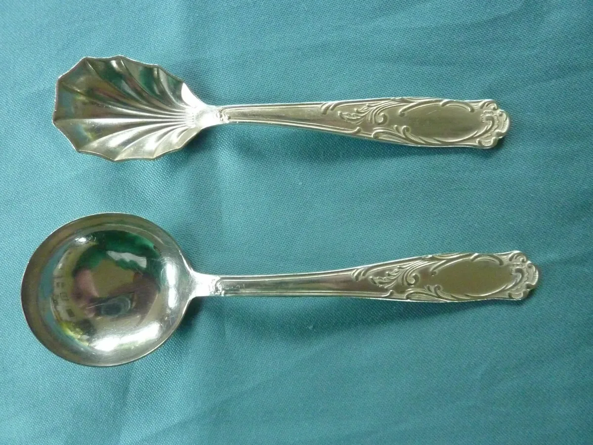 Vintage sugar and cream spoon set