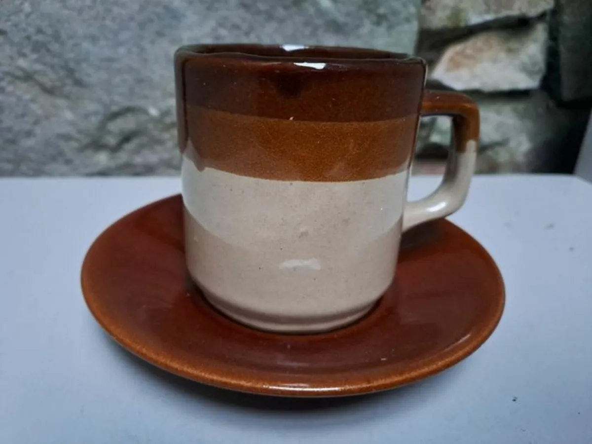 Dark and light brown cup and saucer - Image 1