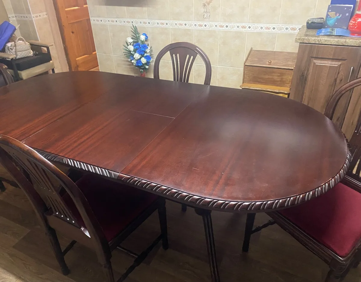 Wooden dining table and chairs - Image 1