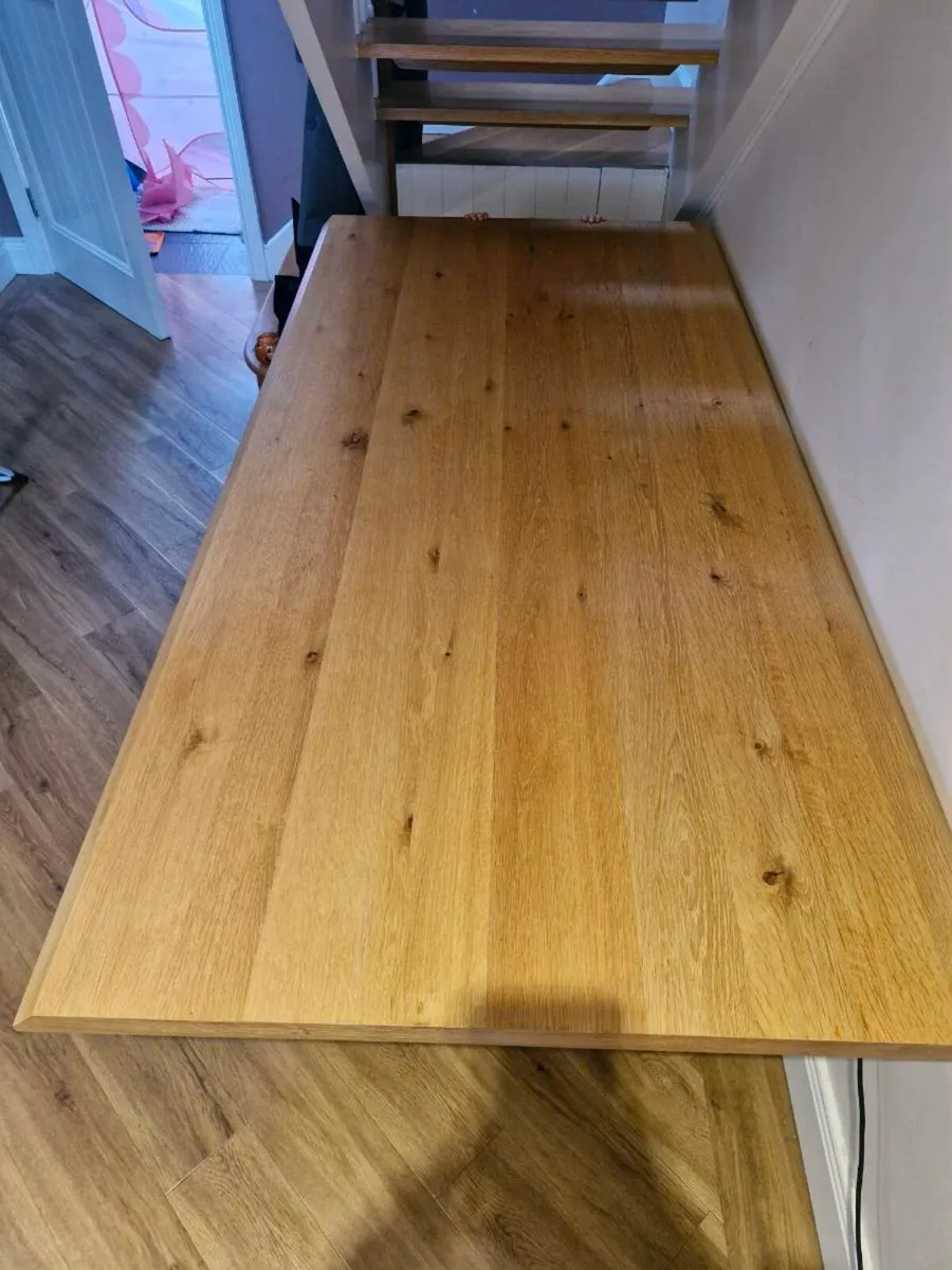 Solid oak dining table with black metal base - Image 3