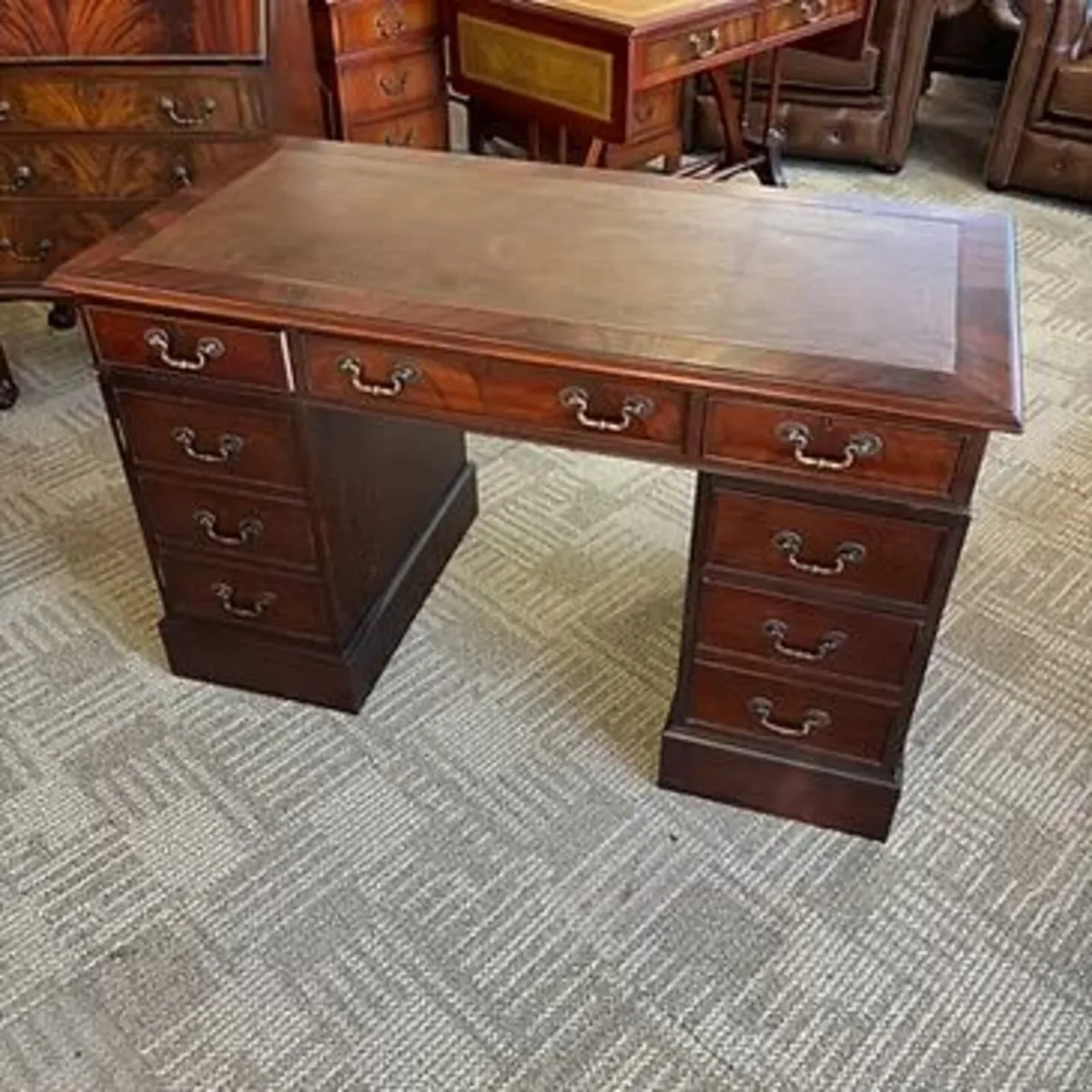 Fabulous mahogany tan leather pedestal writing des
