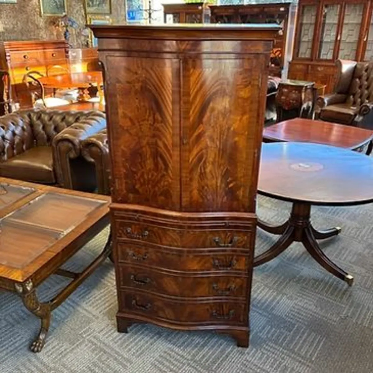 Fabulous mahogany flamed drinks cabinet. Long draw