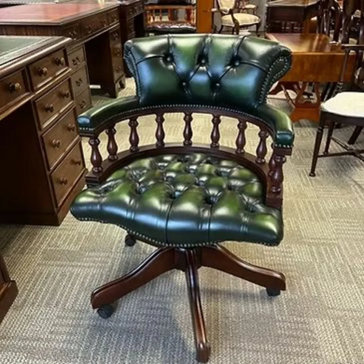 Fabulous green leather mahogany framed button back