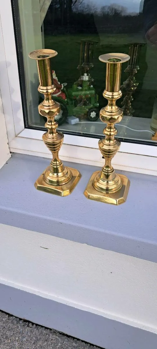2 Old tall brass candle stick holders