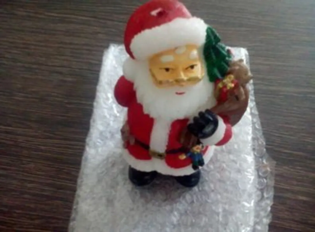 Santa Claus Candle Figure.