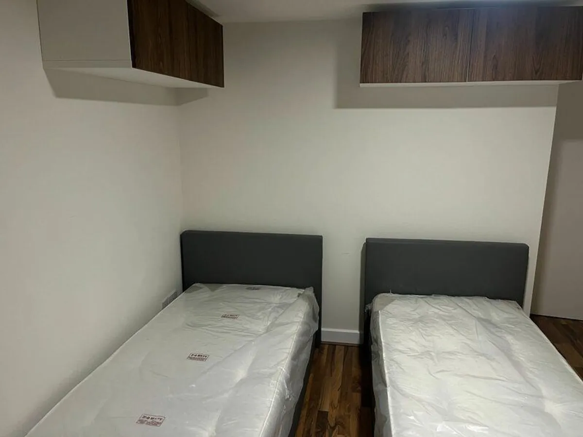 Two single beds with storage - Image 4
