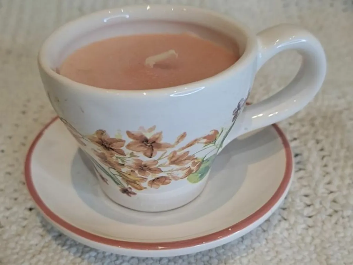 Miniature vintage teacup and saucer with candle - Image 1