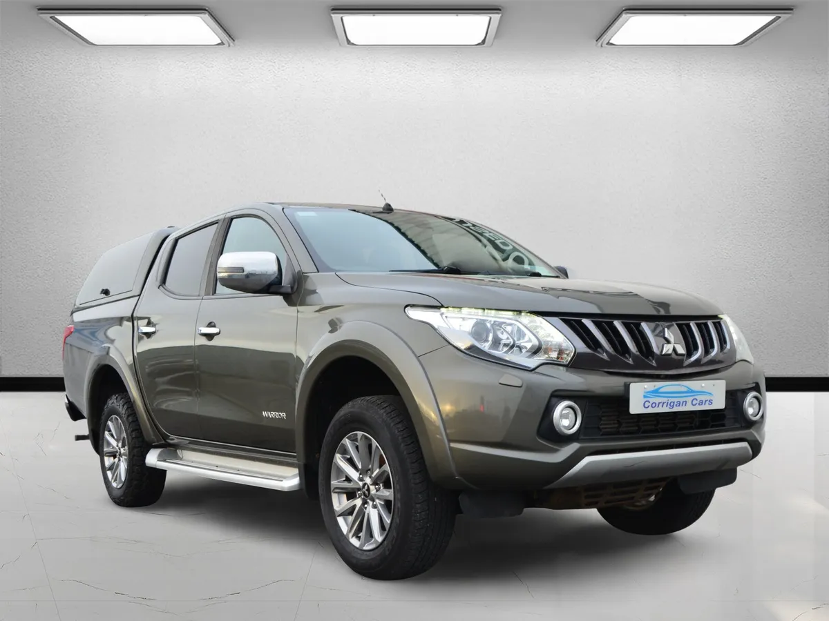 Mitsubishi L200 with gull wing canopy - Image 1