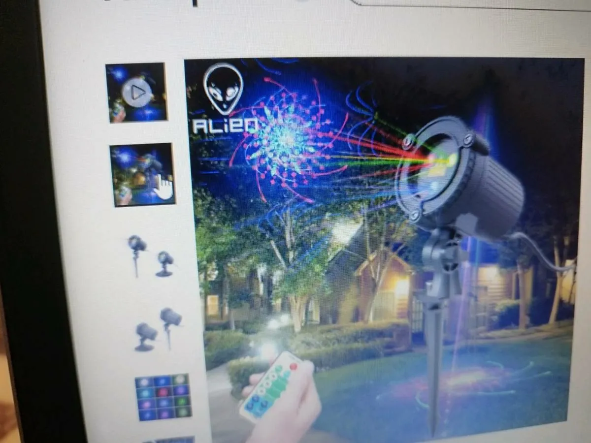 Christmas Laser Projector Outdoor Light Remote - Image 1