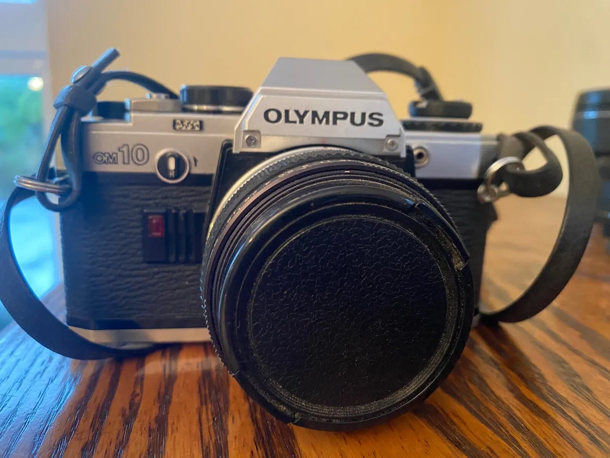 Olympus OM-10 35mm Film Camera + Lens – Quick Sale - Image 1