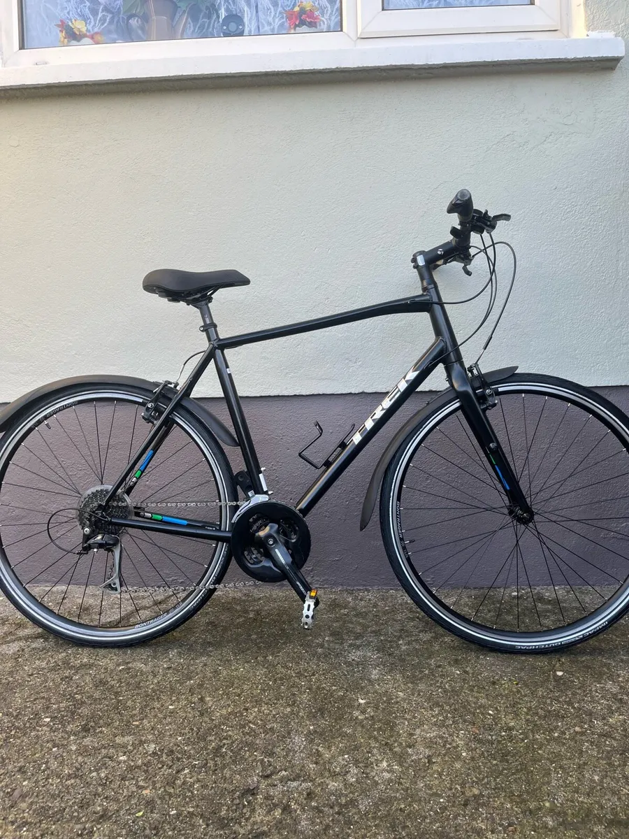 Man Trek, FX3 , Hybrd bike. - Image 1