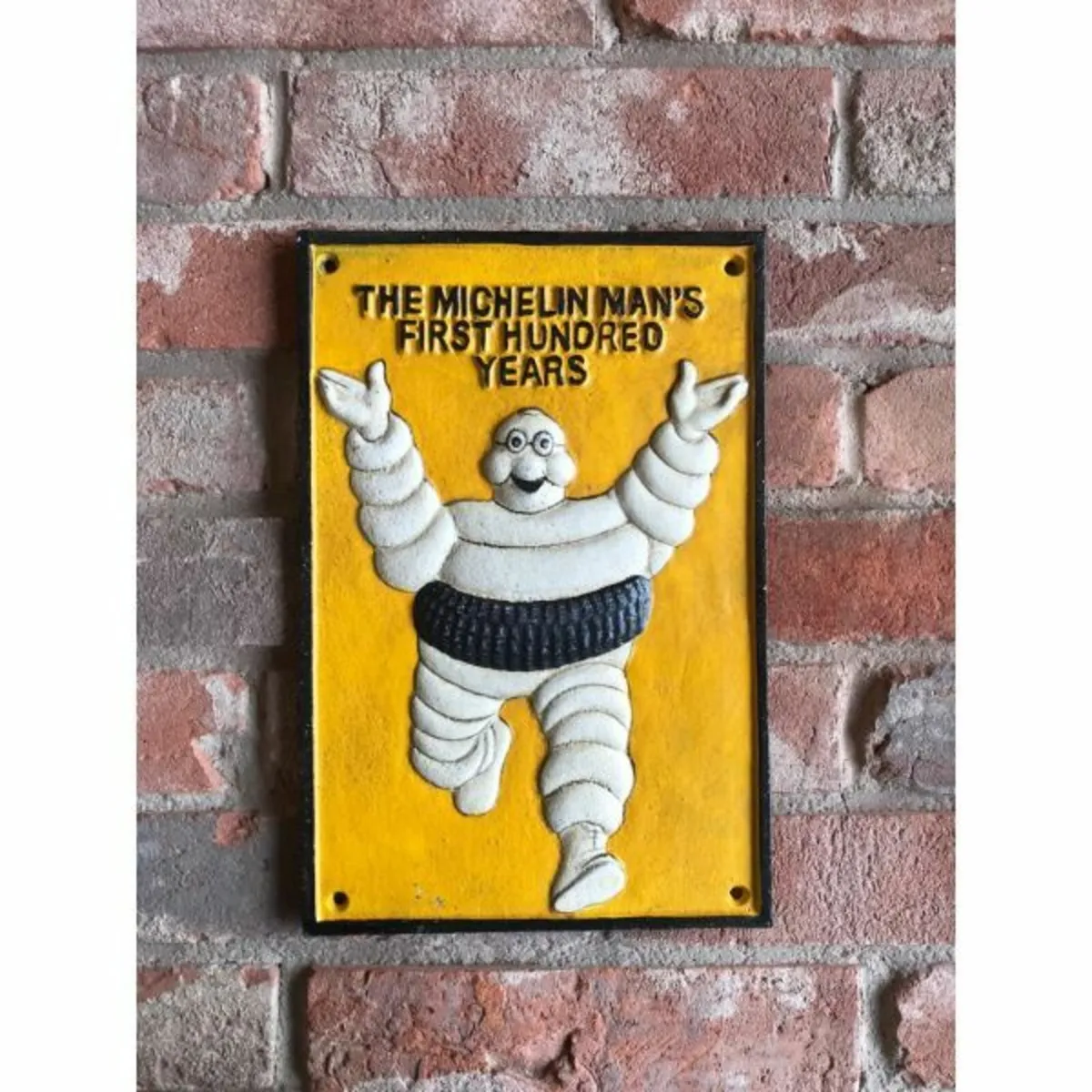 Michelin Man 100 Years Yellow Cast Iron HS246