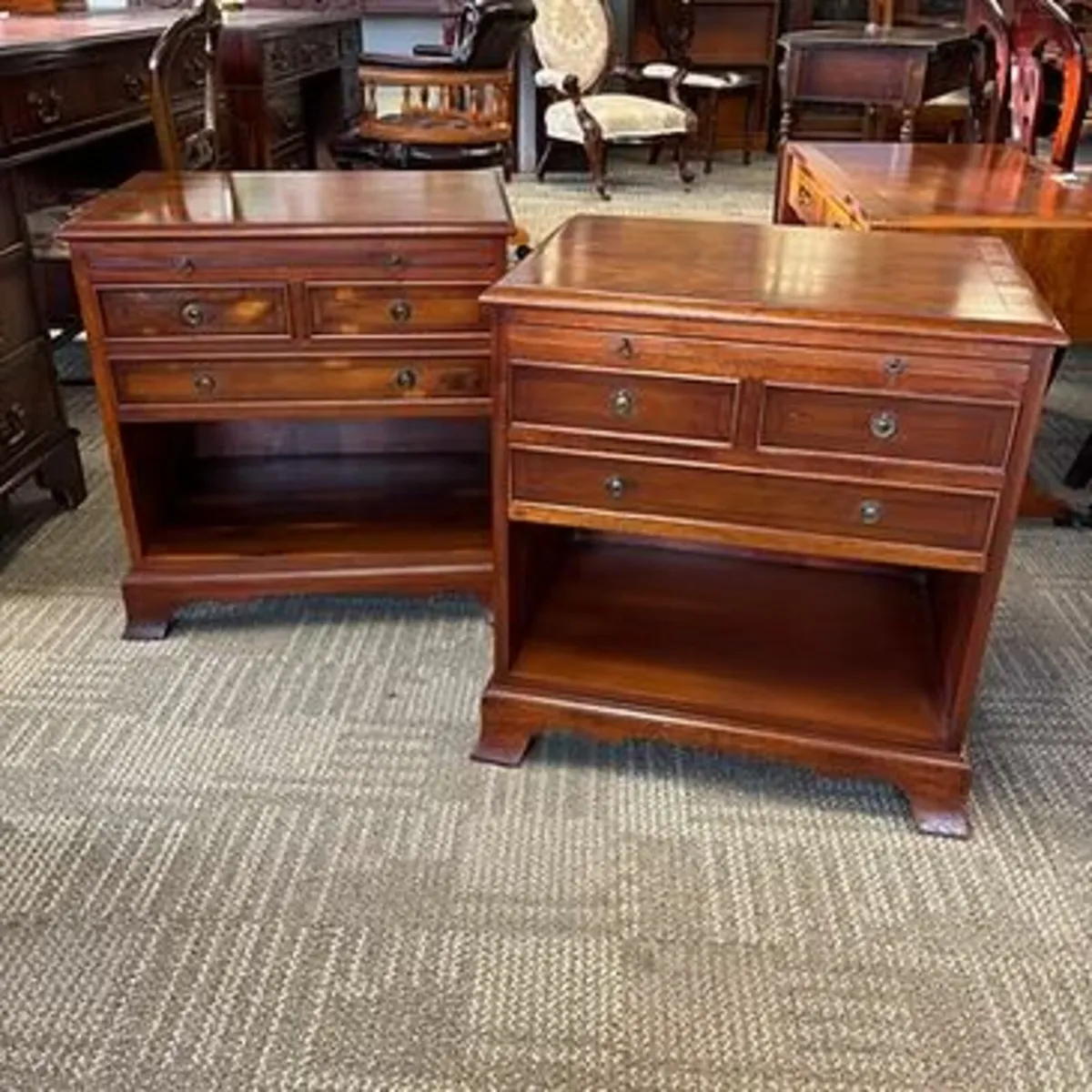 A pair of George III style yew wood side lockers