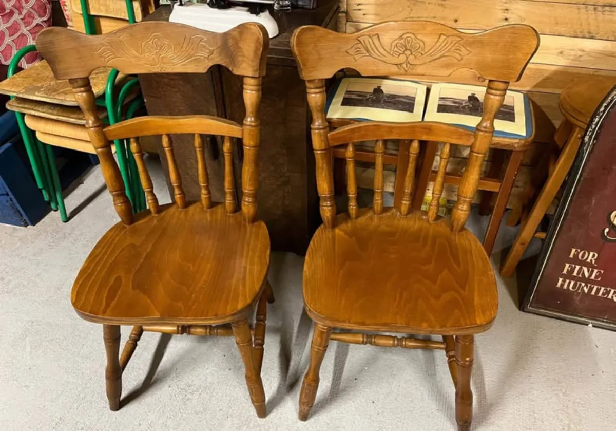 Pair of carved oak country kitchen chairs - Image 1