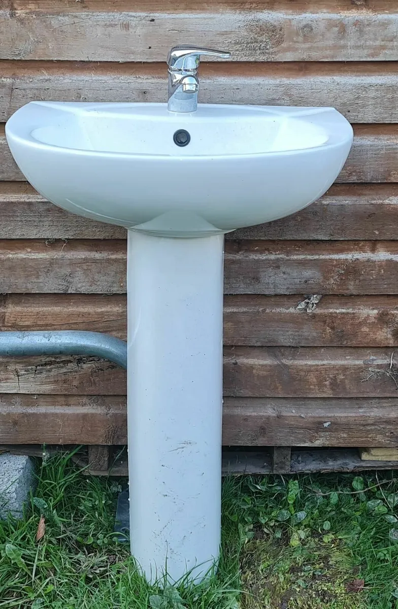 A wash basin with mixer tap - Image 1