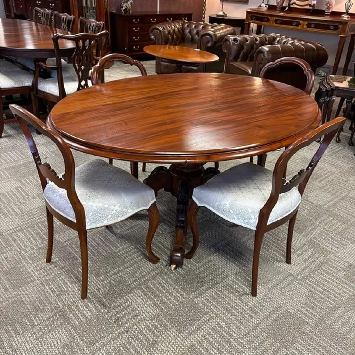 Antique Victorian oval shaped quadlet base dining