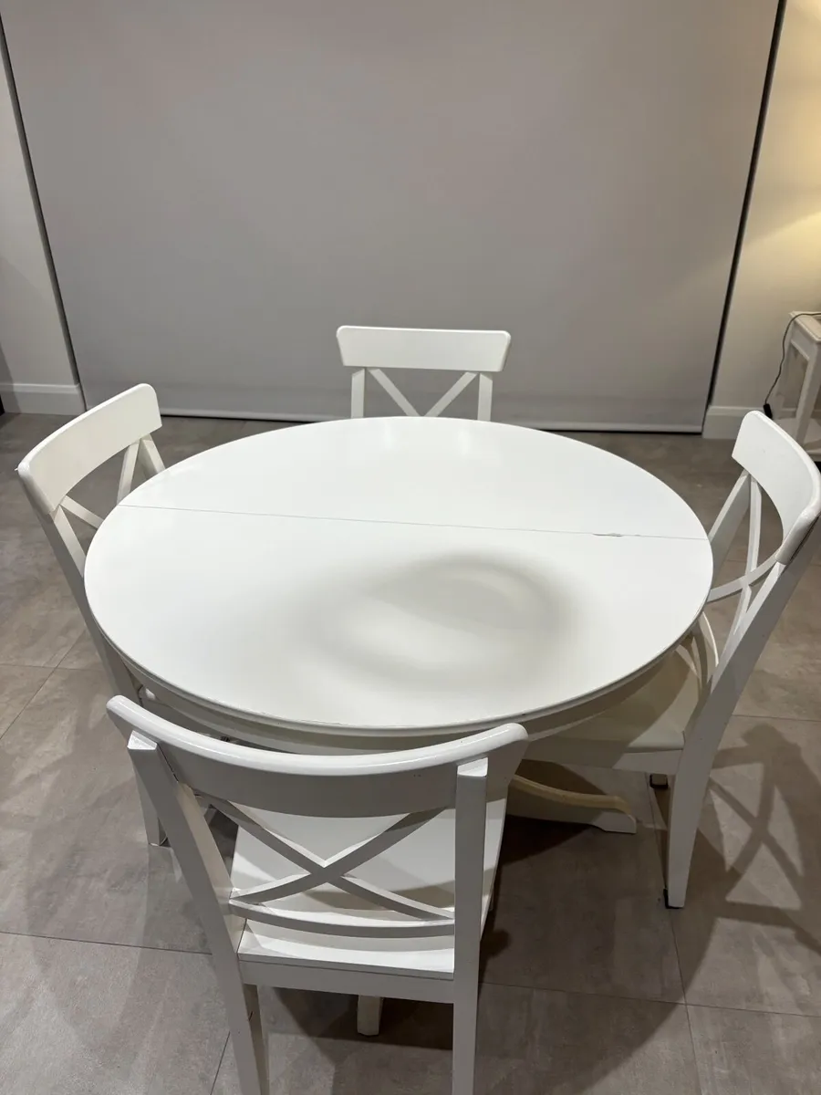 Round White Wooden Table and Four Matching Chairs - Image 1